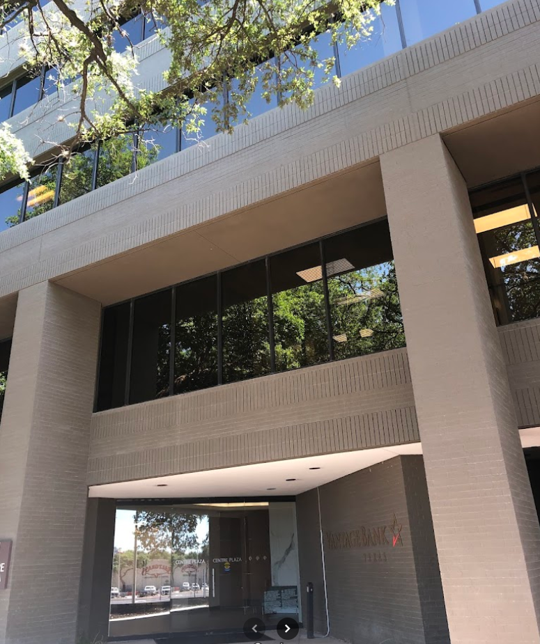 San Antonio office building of Law Office of Bryan Fagan, featuring glass exterior and entrance of Vantage Bank, located at 45 NE Interstate 410 Loop, Texas.